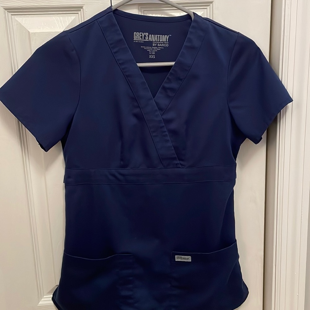 Grey’s Anatomy 3 pocket mock wrap scrub top. Indigo (navy blue) size XXS